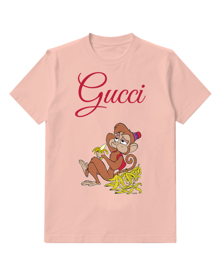 Blush Pink Monkey Sits Holding Banana Peel Graphic T-Shirt - front product view