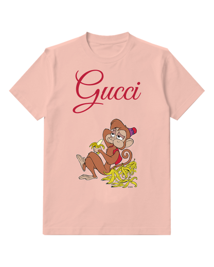 Blush Pink Monkey Sits Holding Banana Peel Graphic T-Shirt - front product view