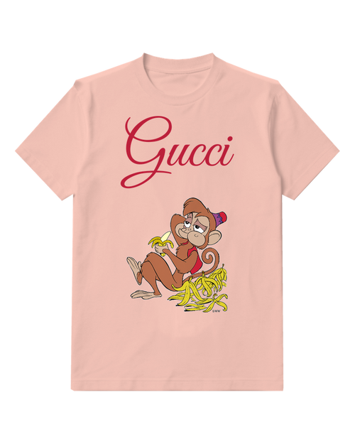 Blush Pink Monkey Sits Holding Banana Peel Graphic T-Shirt - front product view