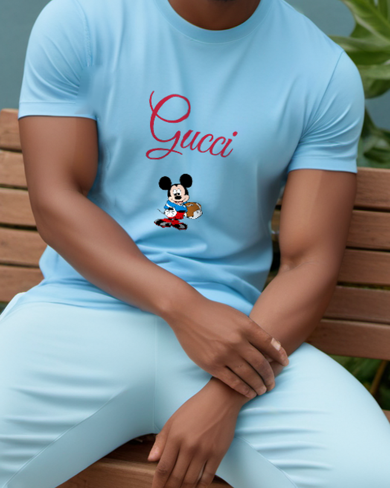 Sky Blue Mickey Mouse Holding Football Graphic T-Shirt - model wearing view