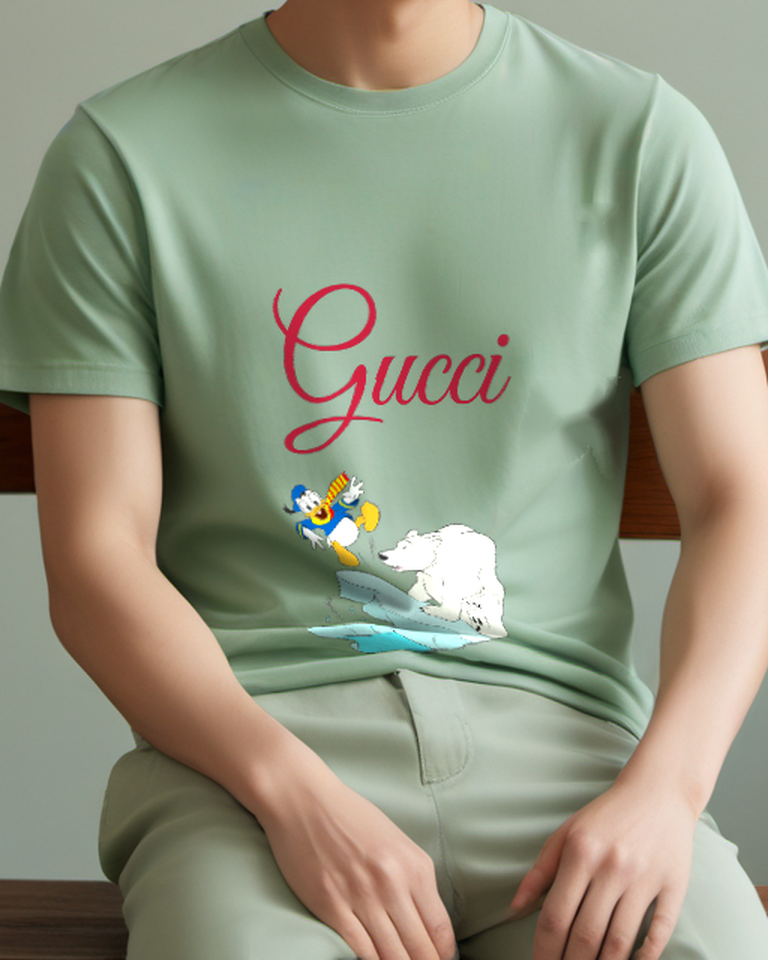 Sage Green Donald Duck Leaps Off Ice Graphic T-Shirt - model wearing view
