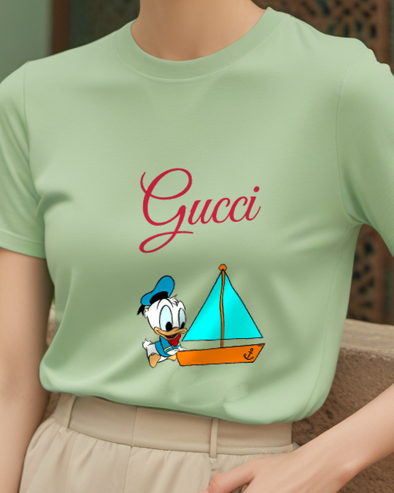 Sage Green Donald Duck Sailing Small Boat Graphic T-Shirt - model wearing view