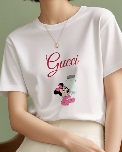 Light Gray Baby Minnie Holding Glowing Jar Graphic T-Shirt - model wearing view