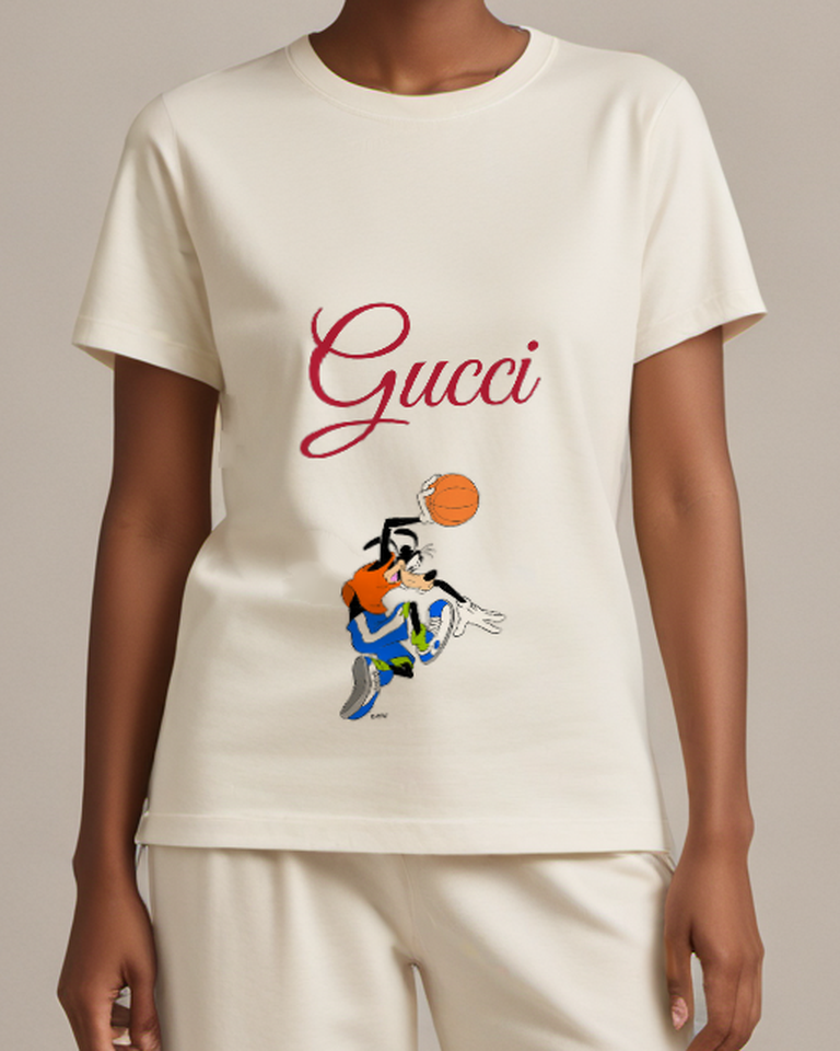 Ivory Goofy Leaping With Basketball Raised Overhead Graphic T-Shirt - model wearing view