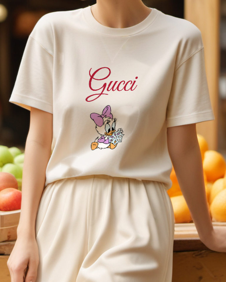 Ivory Daisy Duck Holding Snowflake Graphic T-Shirt - model wearing view