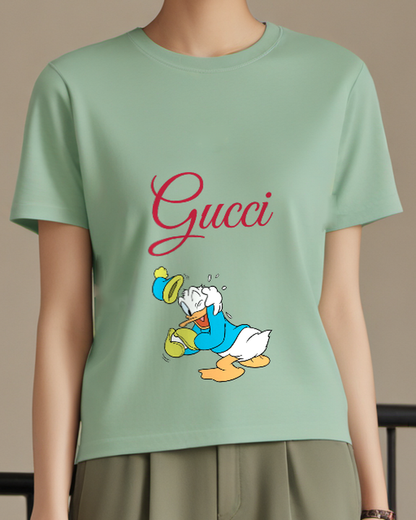 Sage Green Donald Duck In Panic Hat Flying Off Graphic T-Shirt - model wearing view