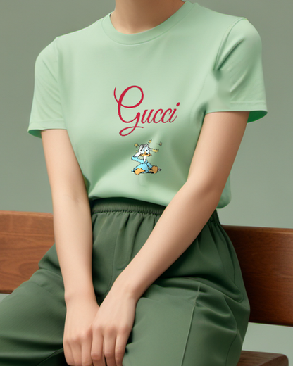 Sage Green Donald Duck Sitting Head Tilted Up Graphic T-Shirt - model wearing view