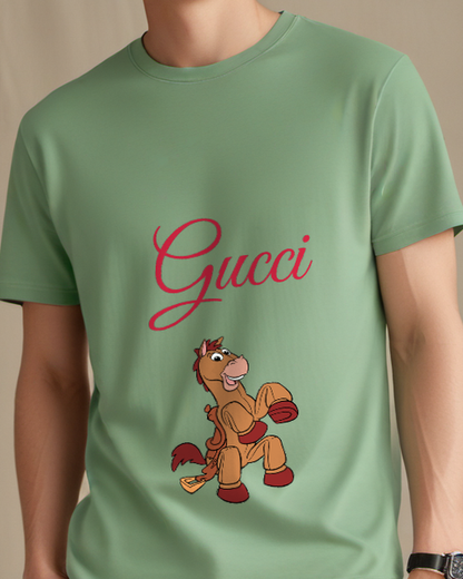 Sage Green Bullseye Sitting Upright Smiling Wearing Boots Graphic T-Shirt - model wearing view