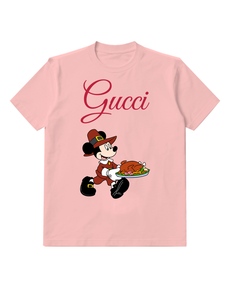 Blush Pink Mickey Mouse In Pilgrim Attire Carrying Turkey Graphic T-Shirt - front product view