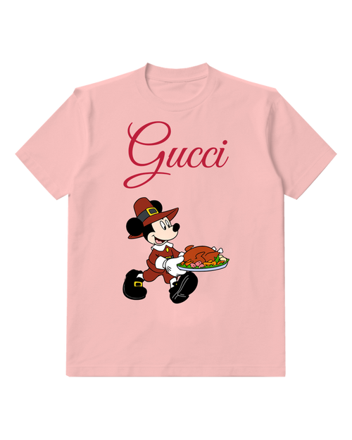 Blush Pink Mickey Mouse In Pilgrim Attire Carrying Turkey Graphic T-Shirt - front product view