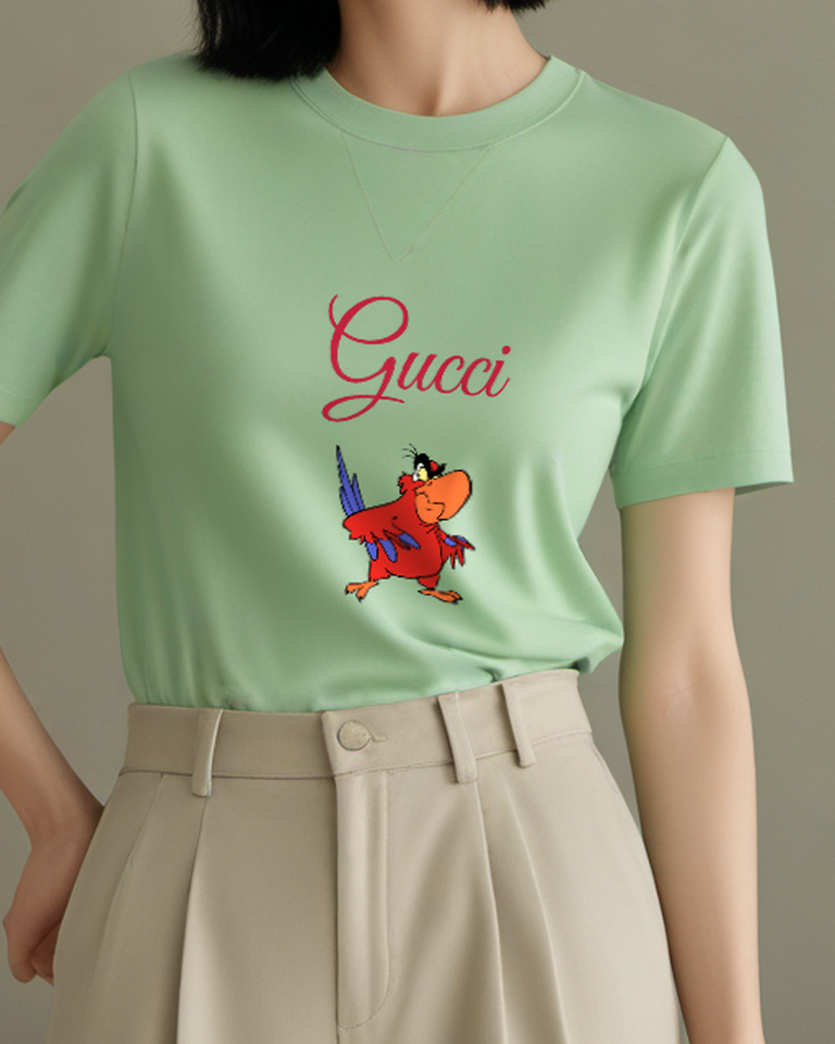 Sage Green Parrot One Wing Raised Graphic T-Shirt - model wearing view