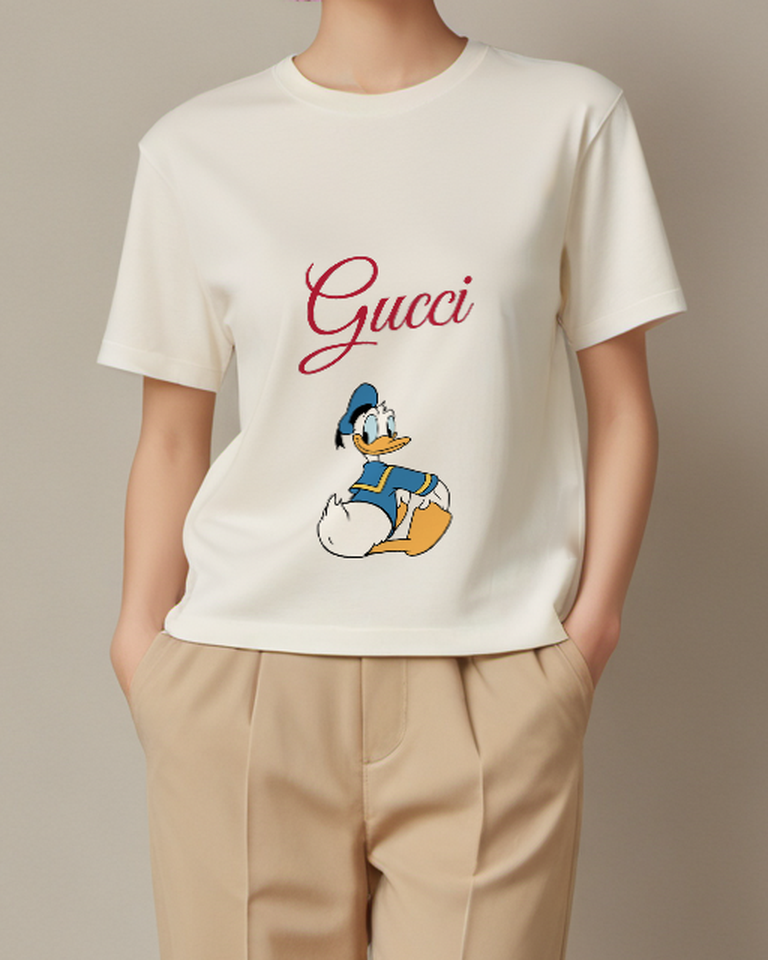 Ivory Donald Duck Sitting Cross Legged Graphic T-Shirt - model wearing view