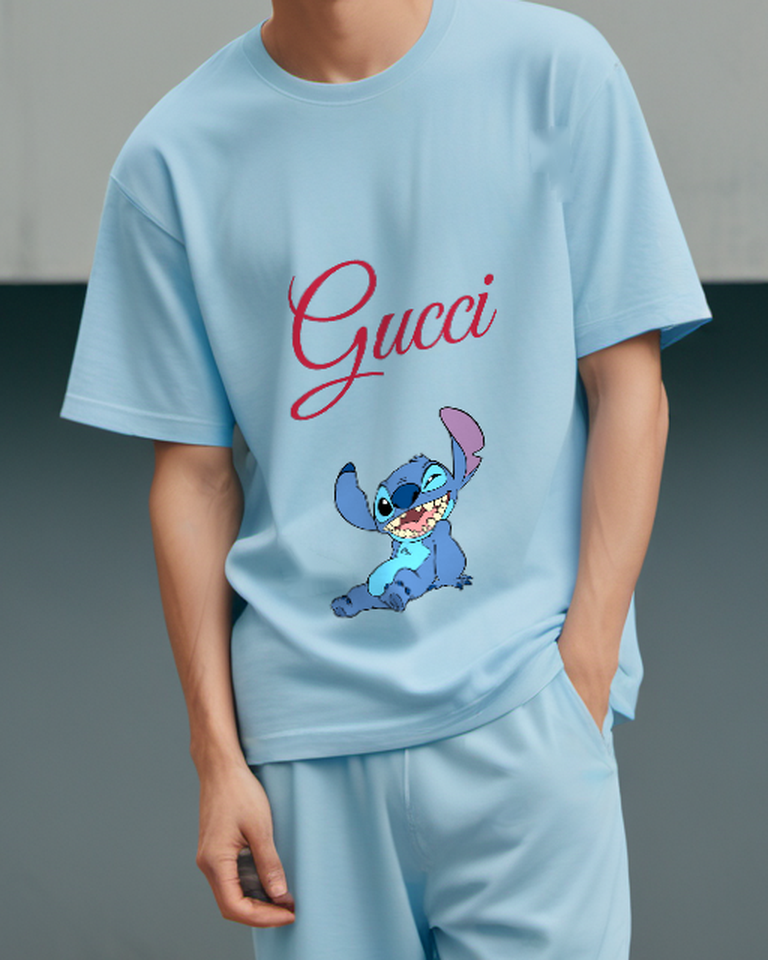 Sky Blue Blue Alien Creature Sitting Upright Graphic T-Shirt - model wearing view