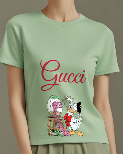 Sage Green Donald Duck Painting Easter Egg Graphic T-Shirt - model wearing view