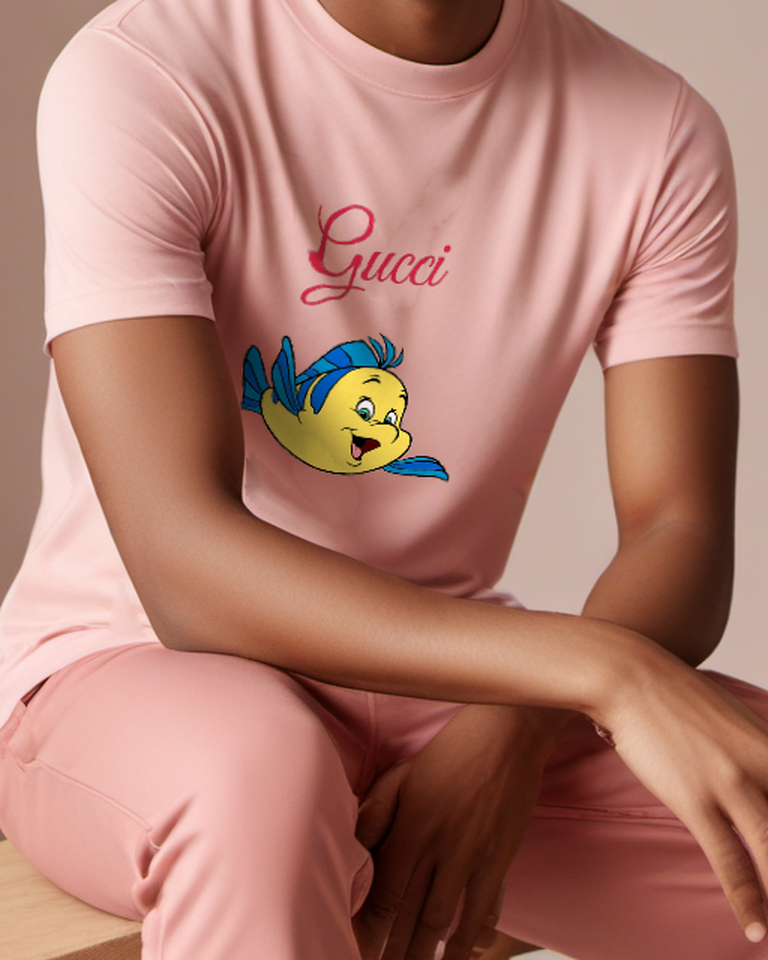 Blush Pink Yellow Fish With Blue Fins Graphic T-Shirt - model wearing view