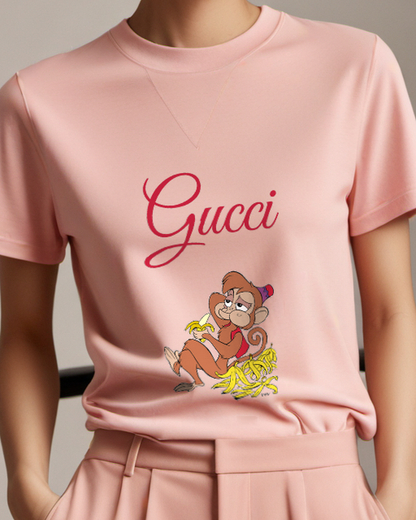 Blush Pink Monkey Sits Holding Banana Peel Graphic T-Shirt - model wearing view
