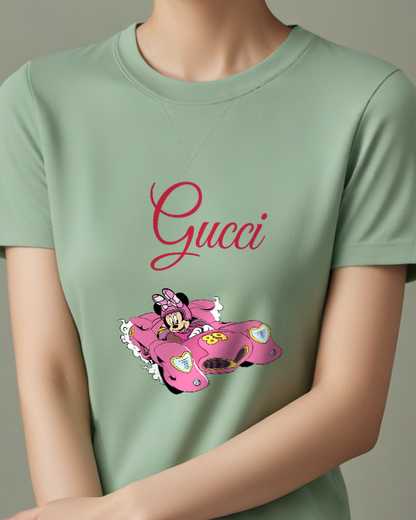 Sage Green Minnie Mouse Racing In Pink Vehicle Graphic T-Shirt - model wearing view