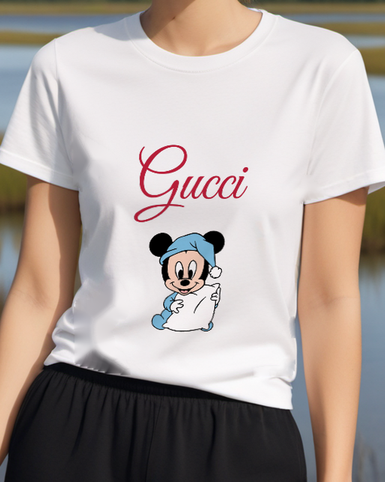 White Baby Mickey In Pajamas Holding Pillow Graphic T-Shirt - model wearing view