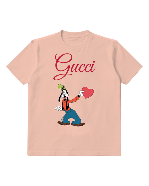 Blush Pink Goofy Holding A Red Heart Graphic T-Shirt - front product view